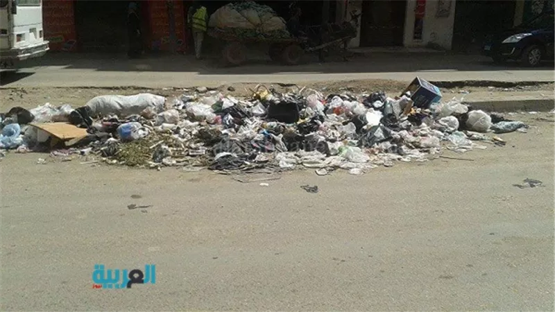 بالصور.. مواطن انتشار القمامة أمام المدارس ببولاق الدكرور 