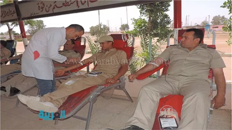 بالصور.. 106 من شرطة النقل يتبرعون بالدم لصالح 