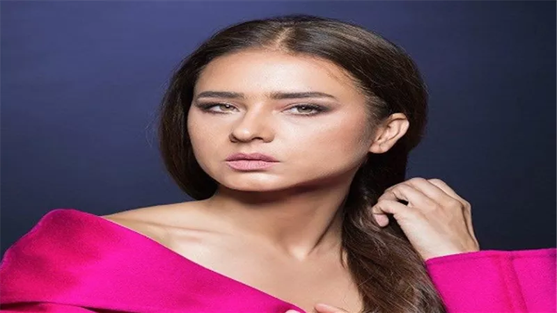 في إحدى جلسات التصوير لـ