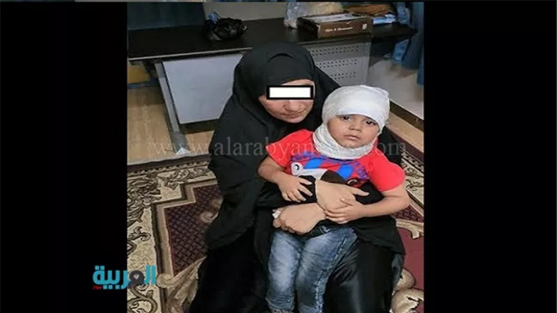 بالصور.. ضبط متسولة تدعي إصابة نجلها في رأسه بمحطة دار السلام