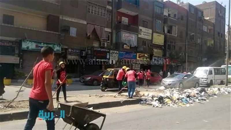 بالصور.. تحالف شباب الثورة يشارك في تنظيف شوارع الجيزة 