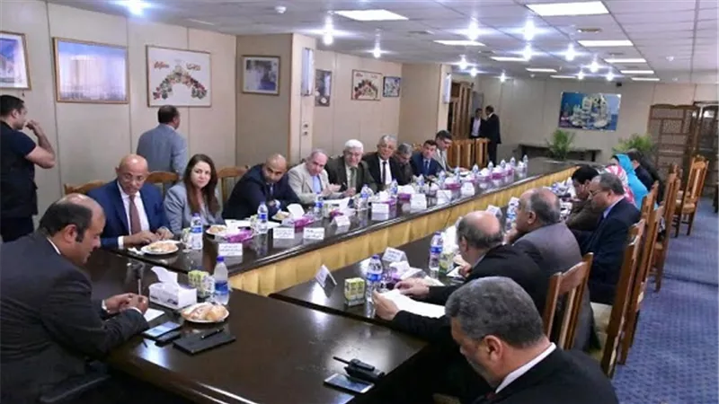 تعاون بين 