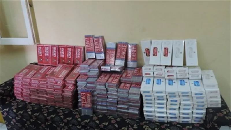 ضبط 4 آلاف علبة سجائر و183 كارت شحن قبل بيعهم بالسوق السوداء بالجيزة