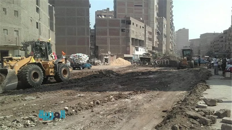 بالصور.. تطوير وتجريد شارع المصرف ببولاق الدكرور 