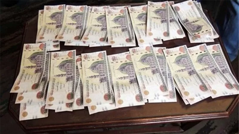 ضبط عاطل بحوزته عملات مزورة بالهرم