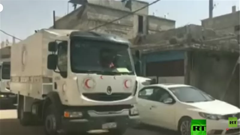 بالفيديو.. دخول قافلة مساعدات إنسانية إلى الغوطة الشرقية عبر معبر الوافدين