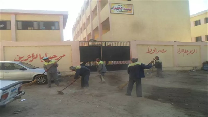 حملة نظافة حول محيط المدارس بالجيزة