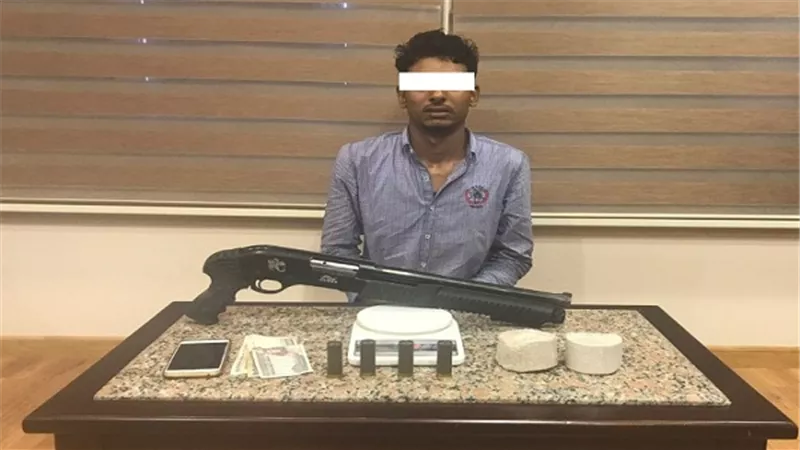 ضبط شخص وبحوزته سلاح نارى وذخائر و500 جرام هيروين