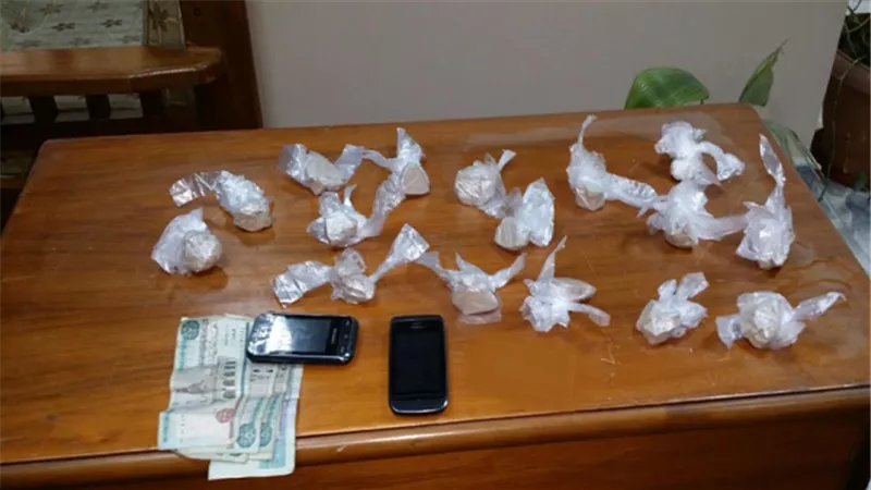 ضبط مسجل خطر وبحوزته 65 تذكره هيروين وسلاح إلي وطلقات نارية ومبلغ مالي