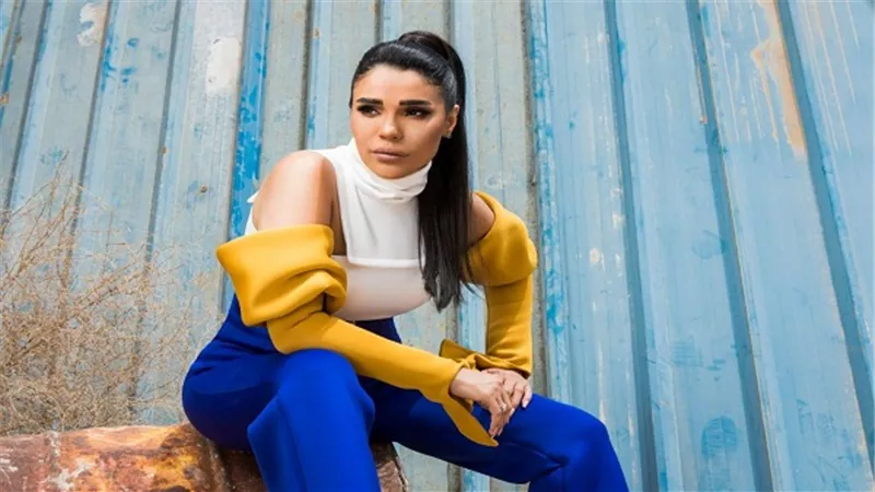 أمينة: سعيدة باختيار الجمهور لي كأفضل مطربة شعبية