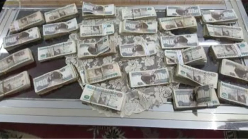 الأموال العامة تضبط شخصين جمعا 5 ملايين من الاتجار فى العملة