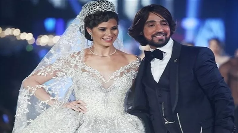 منال الأنصاري والبحيري في عرض أزياء مصري سعودي بدبي