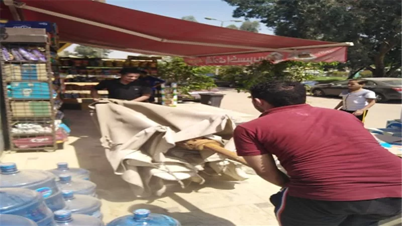 ازالة ورفع اشغالات بشارع السعادة امام الحي الايطالي بالمعادى الجديدة