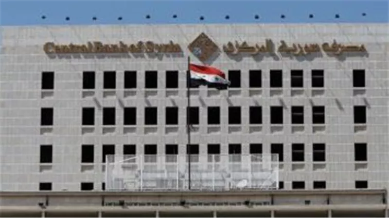 البنك المركزى السورى يقرر تخفيض سعر الصرف للعملة المحلية مقابل الدولار